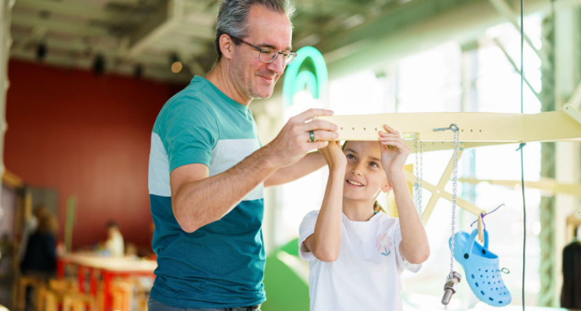 Photo of an adult and a child around the Ville Marie challenge